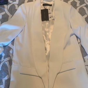 Never worn, white blazer.